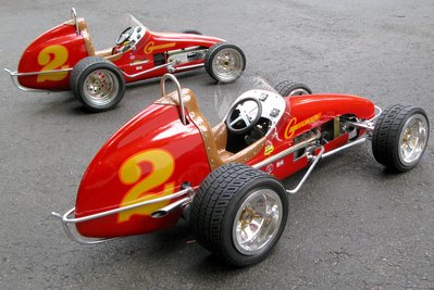 One in front is a static display Offy.  One in back is Kawasaki powered, direct drive.