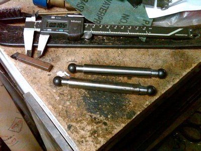 Here are the annealed and bored balls before soldering them to the shaft.